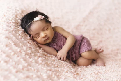 a baby girl peacefully sleeping
